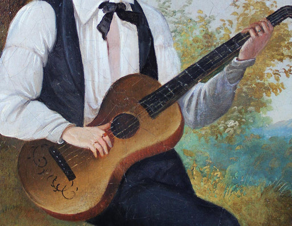 Guitar player in a landscape