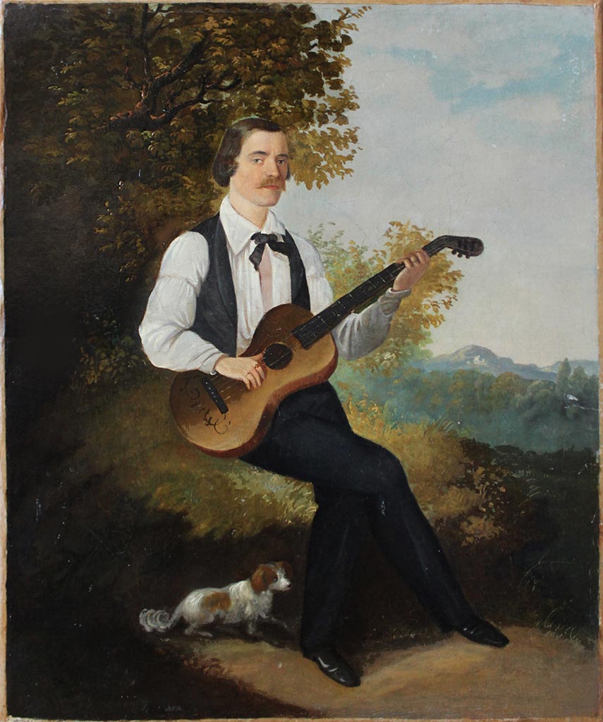 Guitar player in a landscape